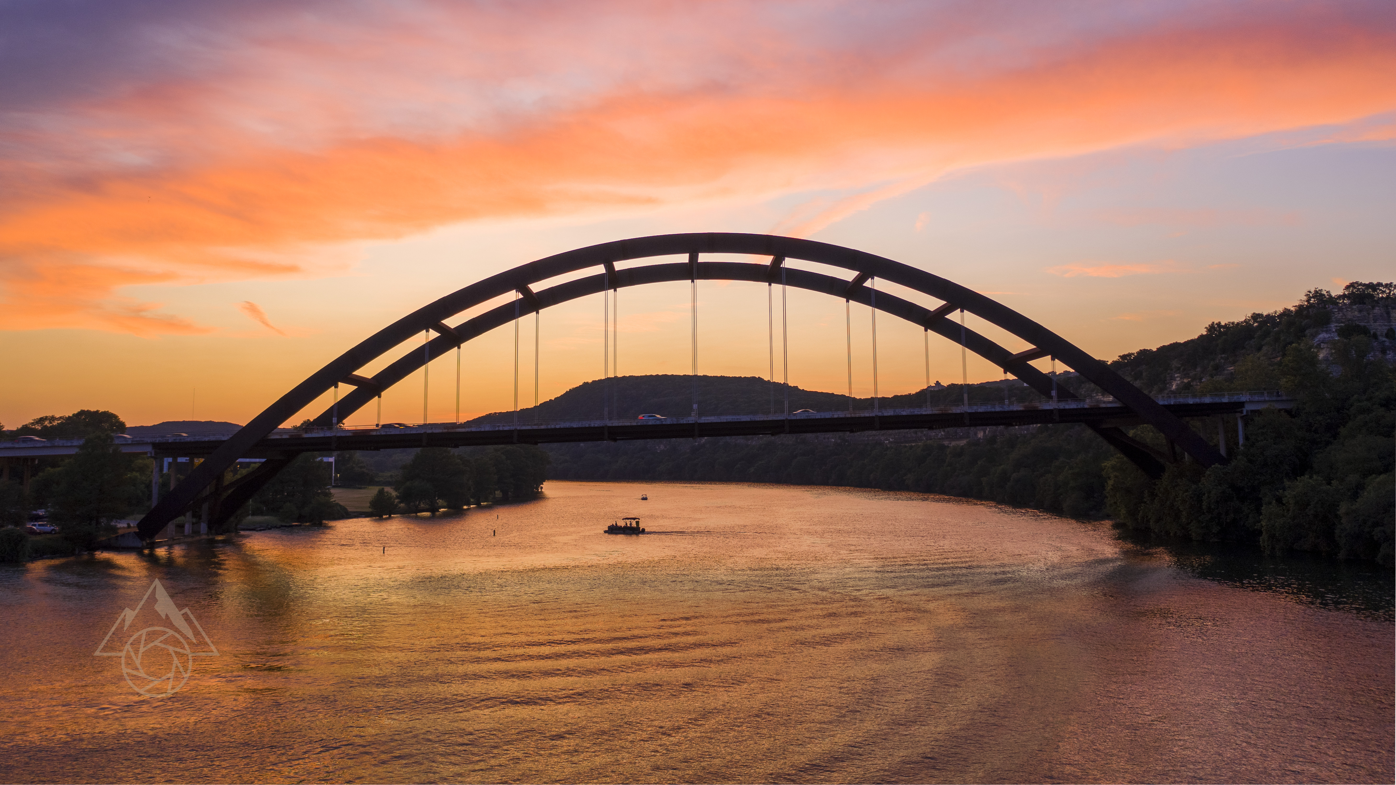 Pennybacker Bridge at sunset over Lake Austin, Texas
